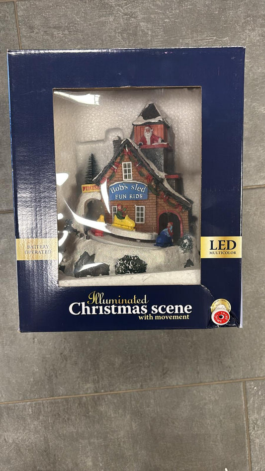 Christmas scene Casetta in ceramica con luci led multicolor e movimento  incorporato